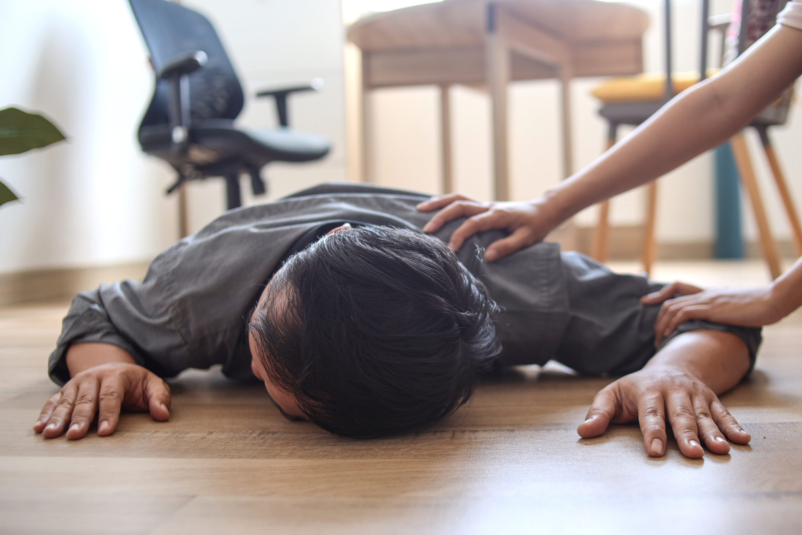 fainted-man-on-the-floor