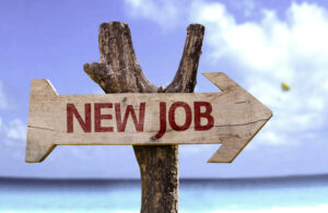 new-job-arrow-sign-at-tropical-beach-change careers