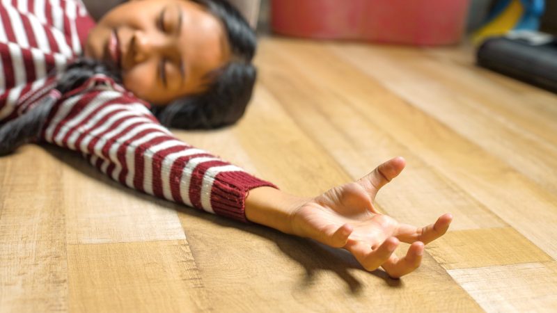 close-up-of-asian-little-girl-with-spasms-hand seizure epilepsy
